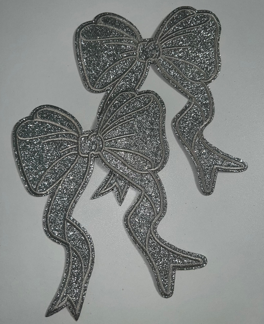Embroidered side bows
