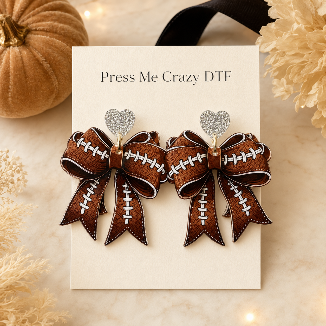 Football bow earrings