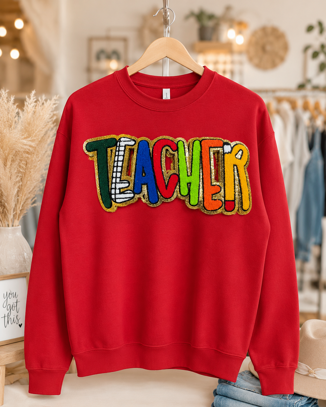 School themed chenille patch crewneck.